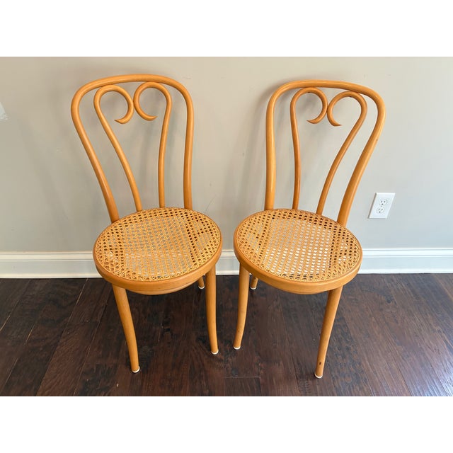 Beautiful pair of Mid-Century "Sweetheart" bentwood chairs. These chairs were produced in the 1960s by ZPM Radomsko in...