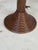 An extraordinary vintage rattan palm tree floor lamp featuring ten beautifully sculpted palm fronds and three hanging...