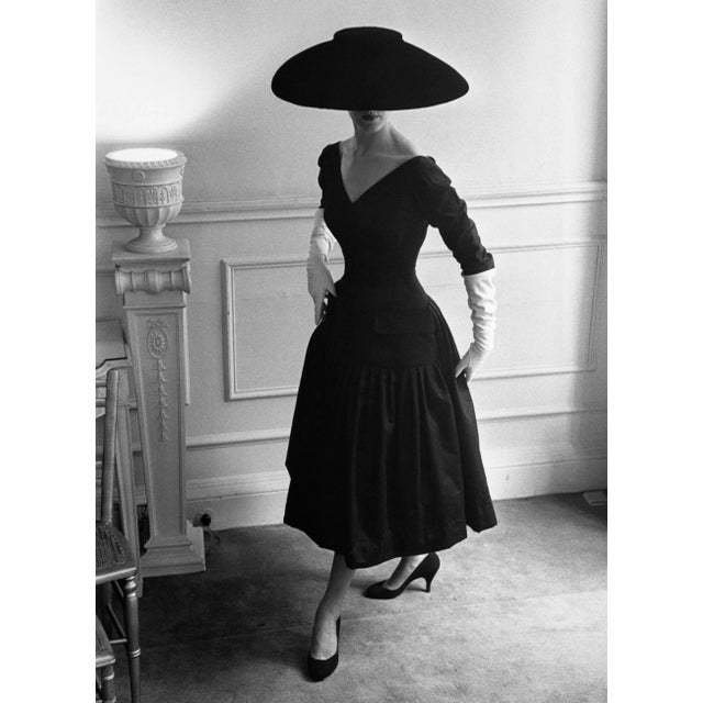 New Look (1955) - Silver Gelatin Fibre Print (Photo by Kurt Hutton/Getty Images) A model wearing a black cocktail dress...