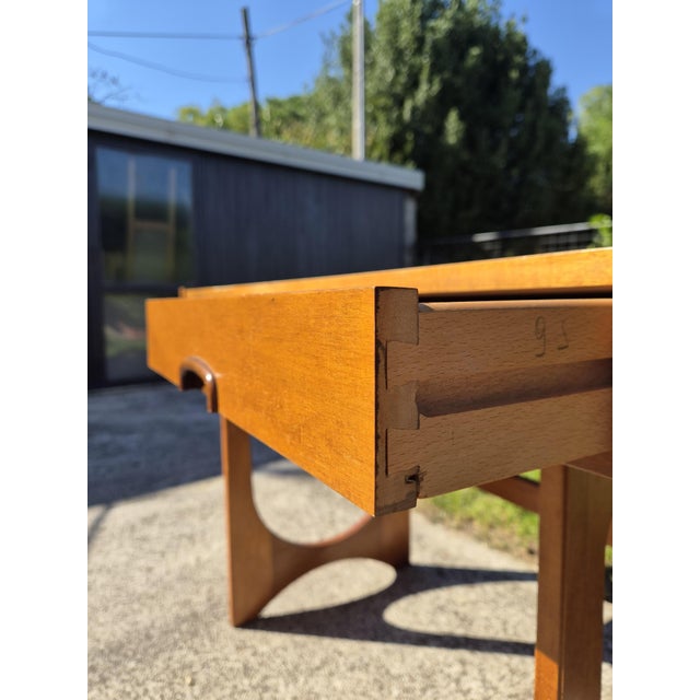 An elegant Midcentury Modern coffee table, designed by R. Bennett for the renowned British manufacturer G-Plan. Crafted...