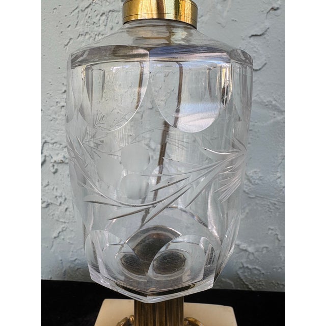 This elegant vintage table lamp features a refined combination of solid brass, cut crystal, and a square marble base,...