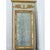 A large 19th-century French Empire-style trumeau mirror that is bold yet refined. Its frame is topped with a gold-gilt...
