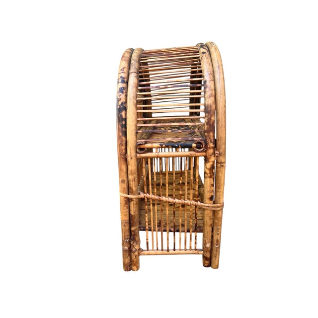 An early-mid 20th century etagere or small table top shelf constructed of bent tortoise shell and split reed bamboo....