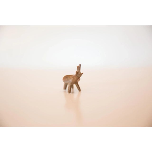 :: Vintage handmade copper casting of a miniature elephant. Circa mid 20th century and possibly older, this piece has such...