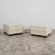 An exceptional pair of bedside tables from the prestigious "hennè" series, designed by acclaimed designer george coslin...