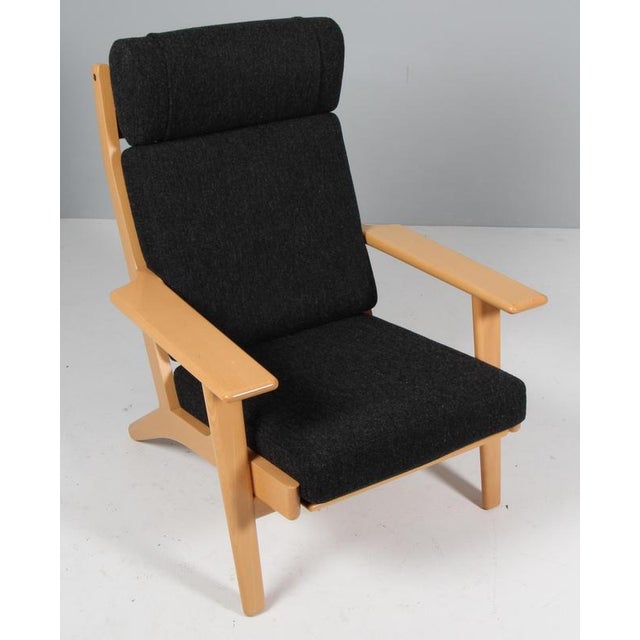 Hans j. Wegner lounge chair made of solid lacquered beech. Original hallingdal wool from kvadrat. Model 290a, made by...