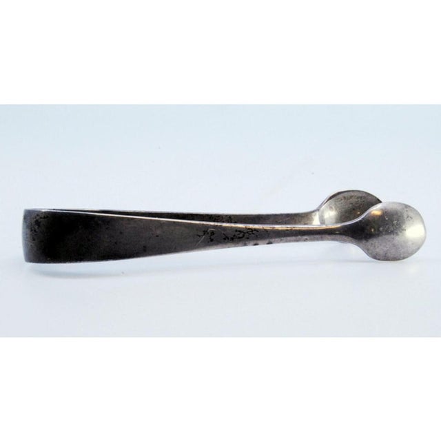 Plain Silver Sugar Tongs, in Very Good conditions. Designed 1920 to 1949 This piece has an attribution mark, I am sure...