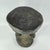 The Tabwa Stool with a fish design, originating from the Democratic Republic of Congo, stands as a striking example of the...