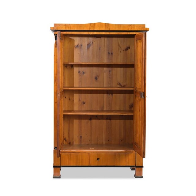 Hallway cabinet/closet/dining room cabinet, Southern Germany, Biedermeier, circa 1820, cherry wood, one base drawer, three...