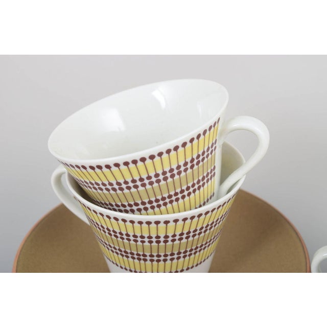 Rörstrand "Mandarin", set of four teacups with saucers. Decorative tableware designed in 1962 featuring the characteristic...