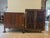 This kitchen cabinet has two sections - the top section has a solid frame with open lattice work on the front and on the...