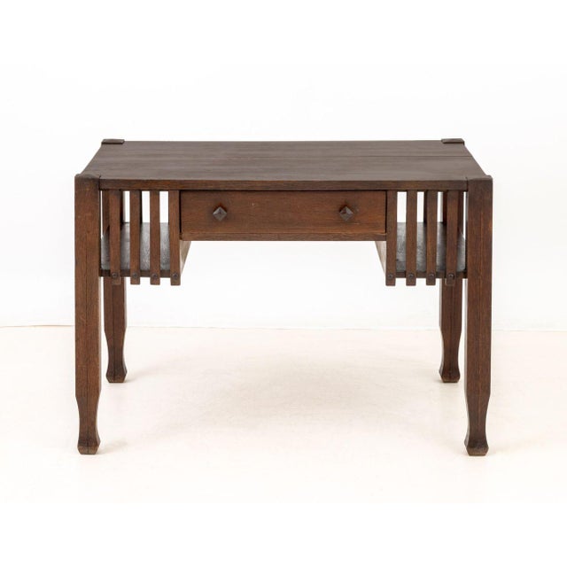 J.M. Young and Sons Arts and Crafts Oak Desk, circa 1920, with single drawer and slat sides, "J.M. Young and Sons /...