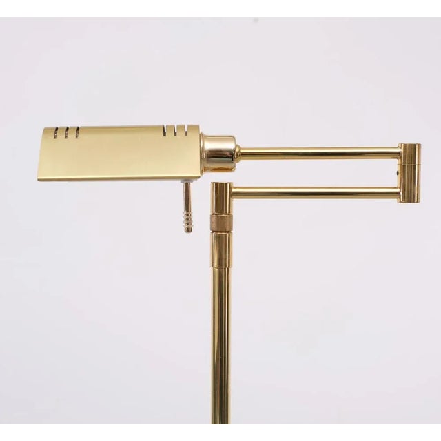 Very nice Brass floor lamp. Adjustable in height. 100 cm /144 cm Halogen, comes with a good working dimmer. Manufactured...