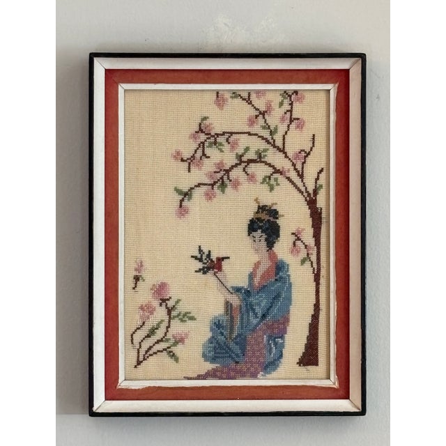 A fun little circa 1950 Japanese-inspired textile artwork featuring a beautiful geisha handsomely adorned in a traditional...