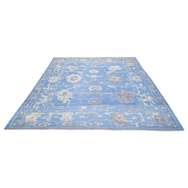 Hand-knotted with care using traditional rug-making techniques, this wool rug blends timeless craftsmanship with a modern...