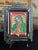This vintage Mexican nicho shrine is a mixed-media devotional work assembled from metal, paper, and applied decorative...