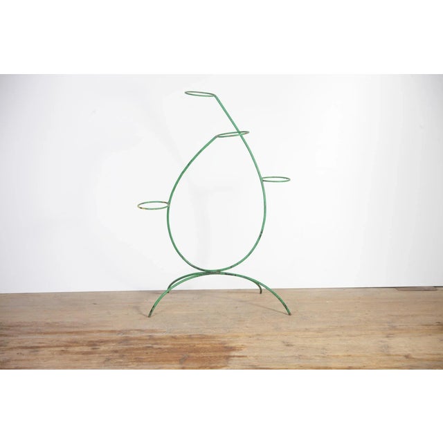 Light green etagere with apparent patina as places. H97 cm, W70 cm, D50 cm. Made in former Czechoslovakia.