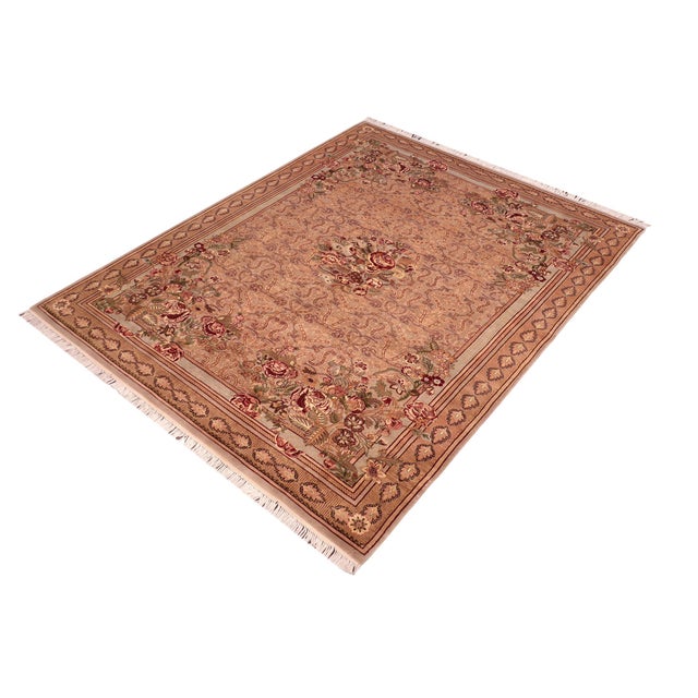 Designed with mesmerizing intricacy and gorgeous color palette, this hand-knotted masterpiece demonstrates the beauty and...