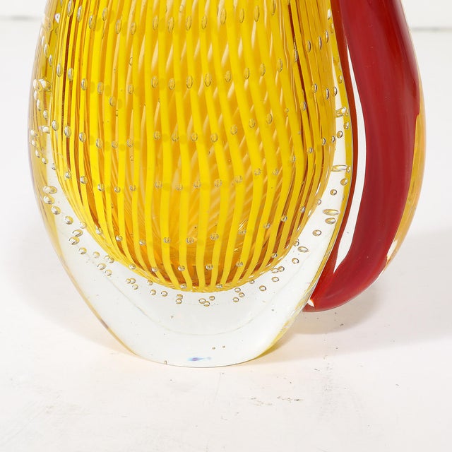 Introduce a splash of vibrant artistry into your home with this exquisite Mid-Century Modernist Hand-Blown Teardrop Form...