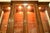Wood Baker Furniture Style French Regency Carved Walnut Lighted Breakfront Bookcase Cabinet For Sale - Image 7 of 12