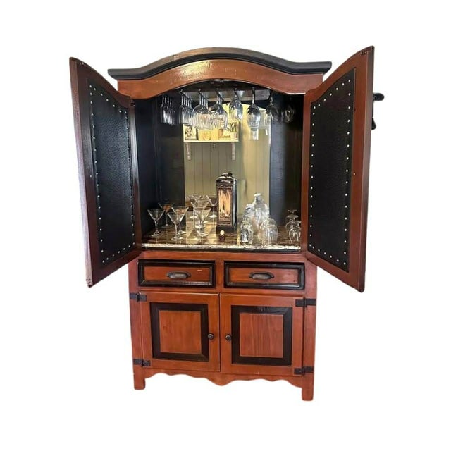 Beautiful solid wood living room bar cabinet, perfect for displaying and storing your barware and spirits. This is a...