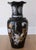 A very rare and special pair of vintage Vietnamese floor vases (24.75" high) from the 1960s made of black lacquer with...