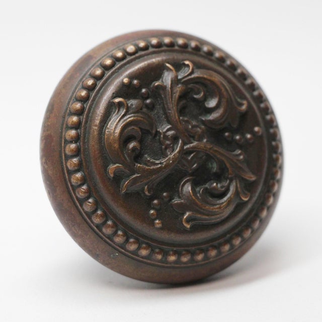 This bronze English Renaissance style three fold knob was made by Russell & Erwin in the 1897 catalog. It is part of the...