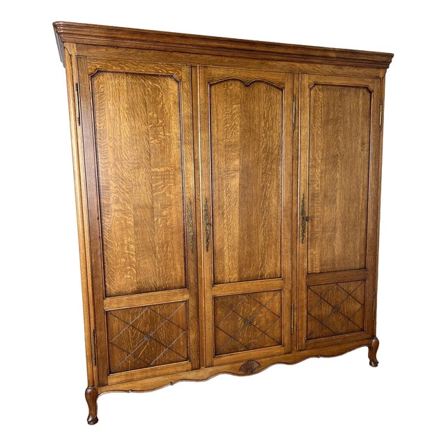 Vintage Louis XVI French Three Door Oak Carved Armoire For Sale