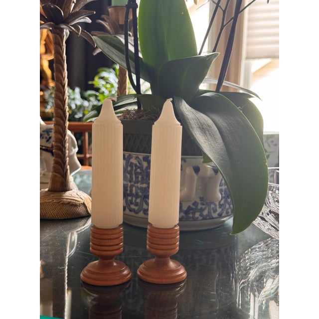 Presenting a pair of turned wood candle holders in a petite size, elegant and interesting in their simplicity. Versatile...