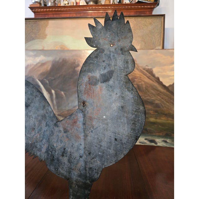 A very fine hand made rooster weathervane folk art now mounted on an iron museum stand . Having sharp percision lines...