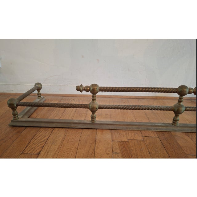 English made solid brass fireplace fender. 41"W with 14"D sides. 8" H at tallest point..
