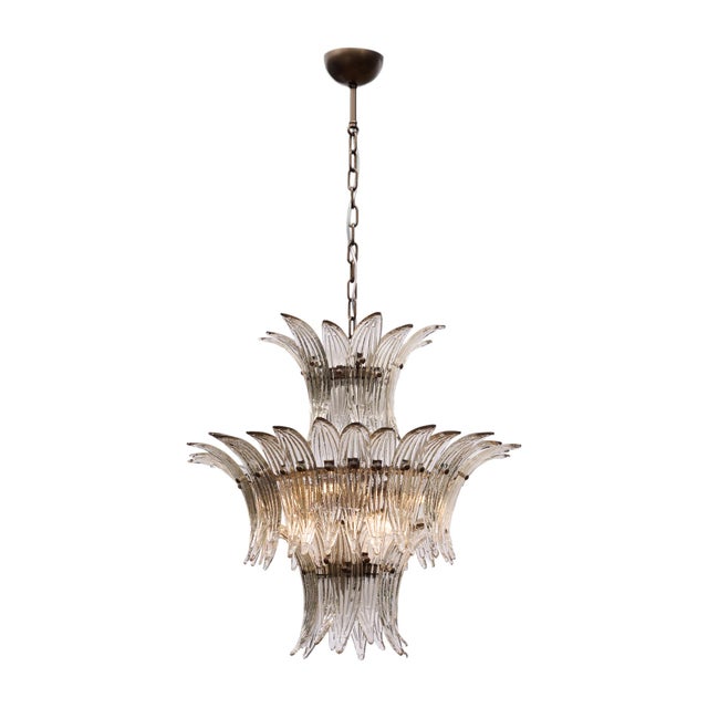 Chandelier from the island of Murano outside of Venice, Italy. This fixture is composed of three alternating tiers of...