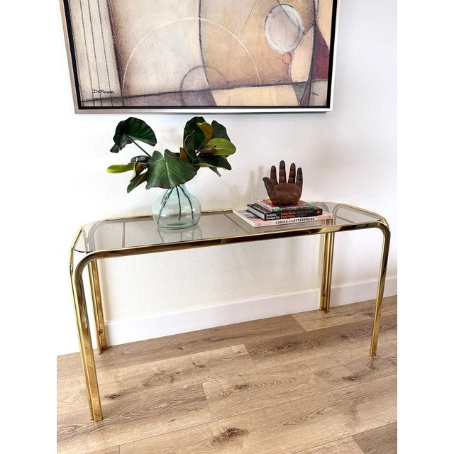 Brass Hollywood Regency Brass Console Table With Smoked Glass Top and Waterfall Edges For Sale - Image 8 of 9