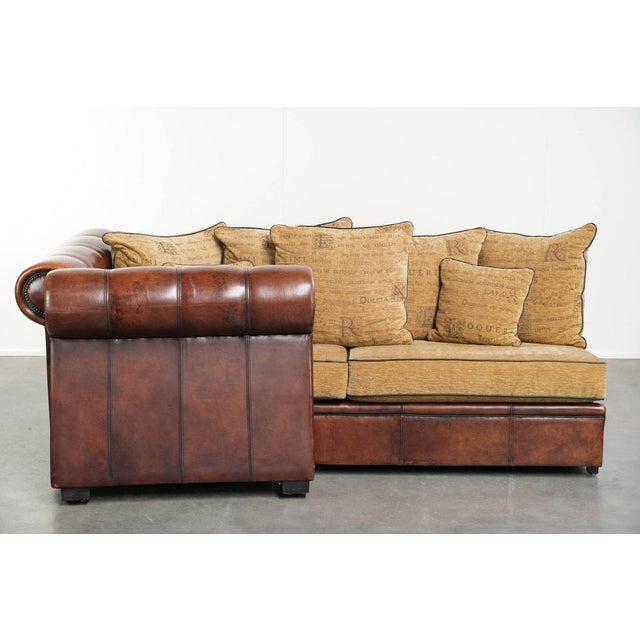 This luxurious, spacious sheepskin 3-seater sofa dates from the late 20th century and features detachable armrests. The...