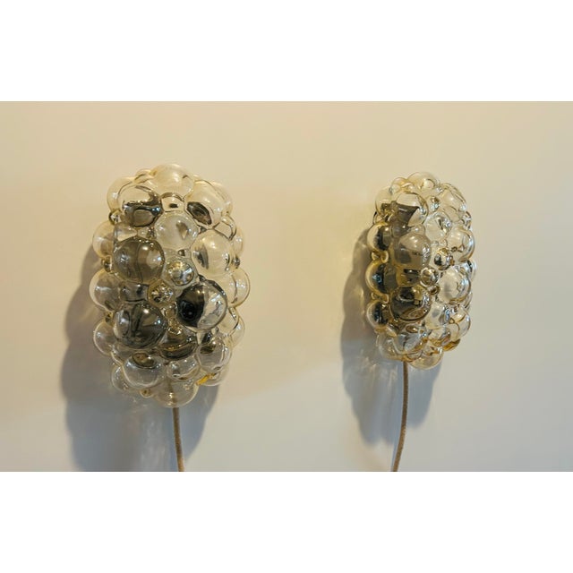 Bubble Wall Lights attributed to Helena Tynell, 1960s, Set of 2, in Good conditions. Designed 1960 to 1969 This piece is...