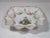 German Dresden porcelain bowl with ruffled sides. It is hand painted and decorated with a courting couple surrounded with...