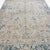 This antique Heriz rug showcases the distinctive geometric and stylized design language of the Heriz tradition in a...