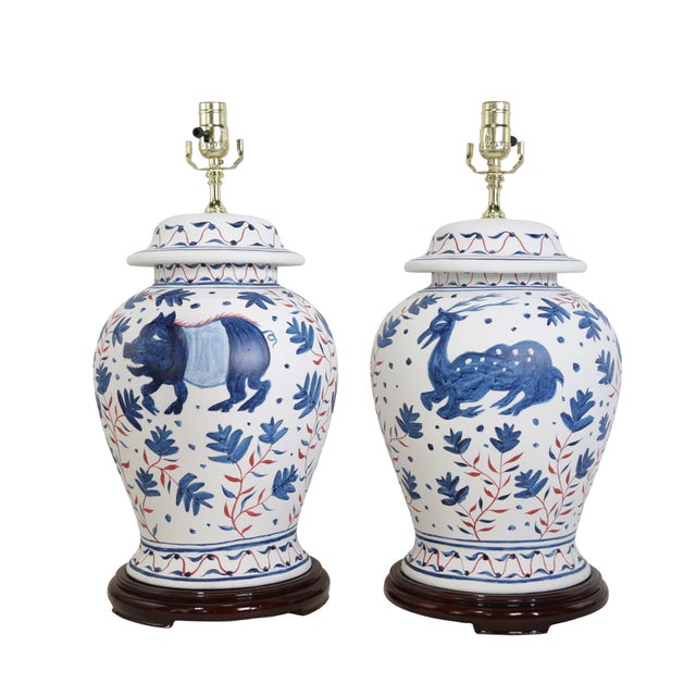 These vintage Brunschwig & Fils Cadiz table lamps feature classic ceramic bodies finished with a warm, antique cream...