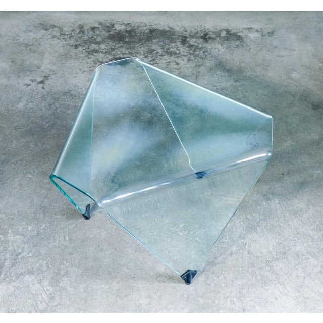 Triangolo coffee table, designed by rimadesio, in curved and beveled transparent glass. Italy, 1980s/1990s origin italy...