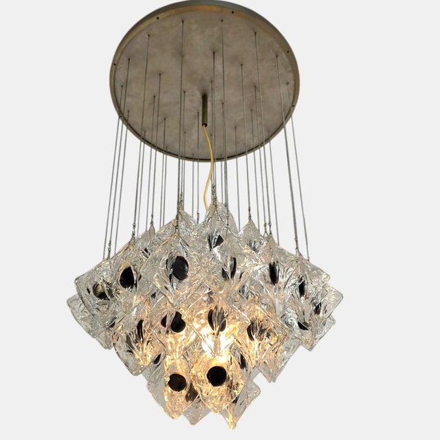 Murano Glass Chandelier from Mazzega, Italy, 1960s, in Very Good conditions. Designed 1960 to 1969 This piece has an...