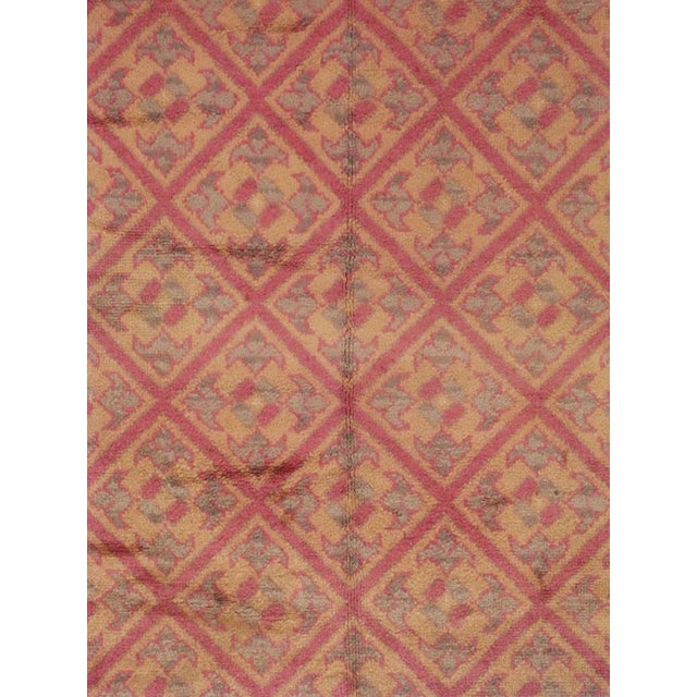 A vintage Austrian carpet in the style of Savonnerie from the mid-20th century. Measures: 8' 0" x 11' 2"