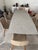 BoConcept Alicante table with supplementary tabletop Size: H29½xW39½xL72¼/103¾" Tabletop: Tabletop: light gray stone...