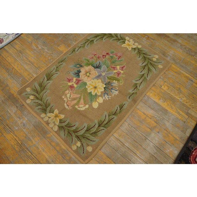 Antique American Hooked rug. Size: 2'3" x 3'1".
