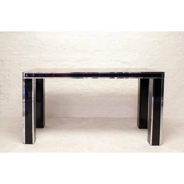 The plate is made of radica/root wood veneer. This piece is designed in the style of the selected designer and/or...