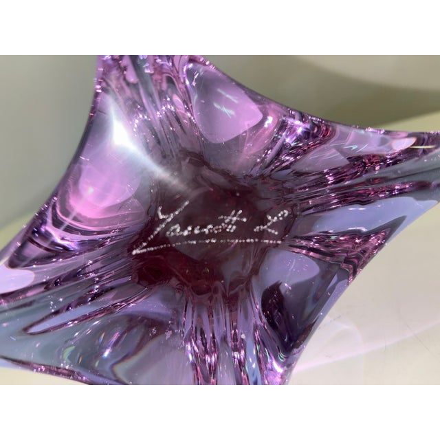 Sculpture depicting a stylized leaping dolphin, marked L. Zanetti on the base. Made in Murano in hand-blown glass by...
