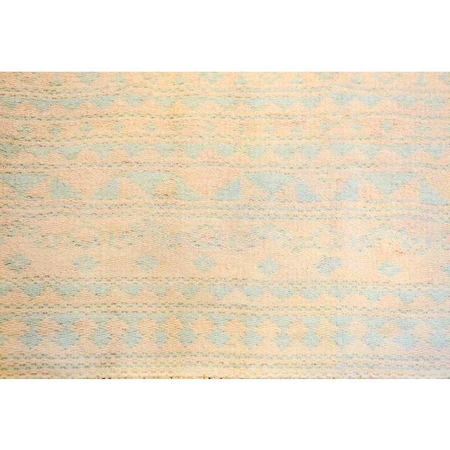A beautiful early 20th century Persian Yazd kilim rug woven in a pale indigo and cream dyed cotton, with an all-over...
