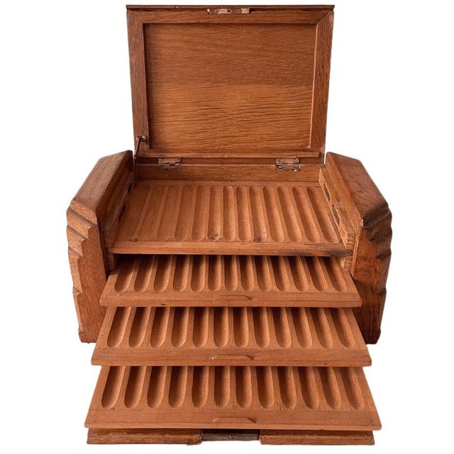 A beautiful vintage Amsterdam School Art Deco cigar box from the 1930s, made of solid oak. This antique cigar box is in...