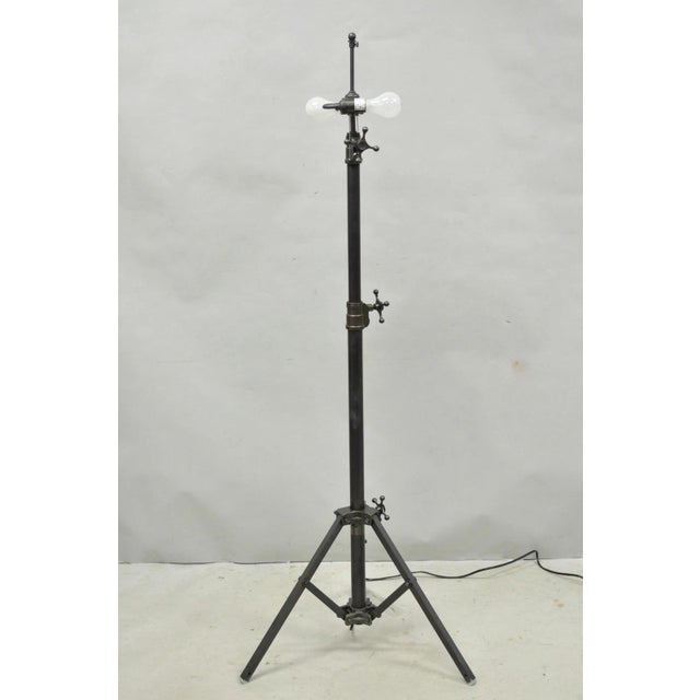 Industrial Modern Thomas O'Brien Studio Bronze Finish Adjustable Height Floor Lamp by Visual Comfort. Circa 21st Century,...