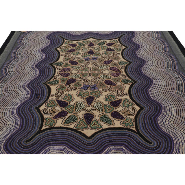 Handmade in wool and originating circa 1920-1930, this 8x11 rug is a rare and exciting new curation in Rug & Kilim’s...