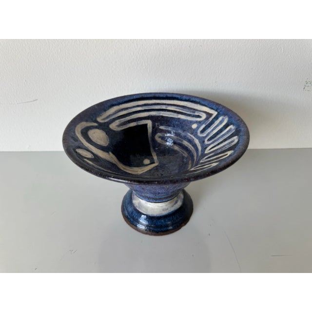 A striking example of 1980s studio pottery, this handmade ceramic pedestal bowl by Mattaway beautifully blends organic...